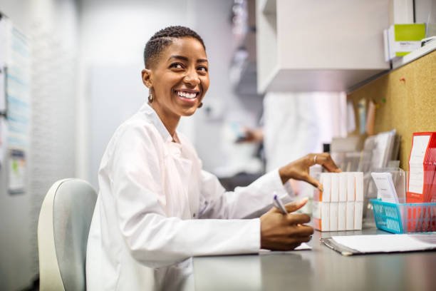Pharmacist at her desk ready to help